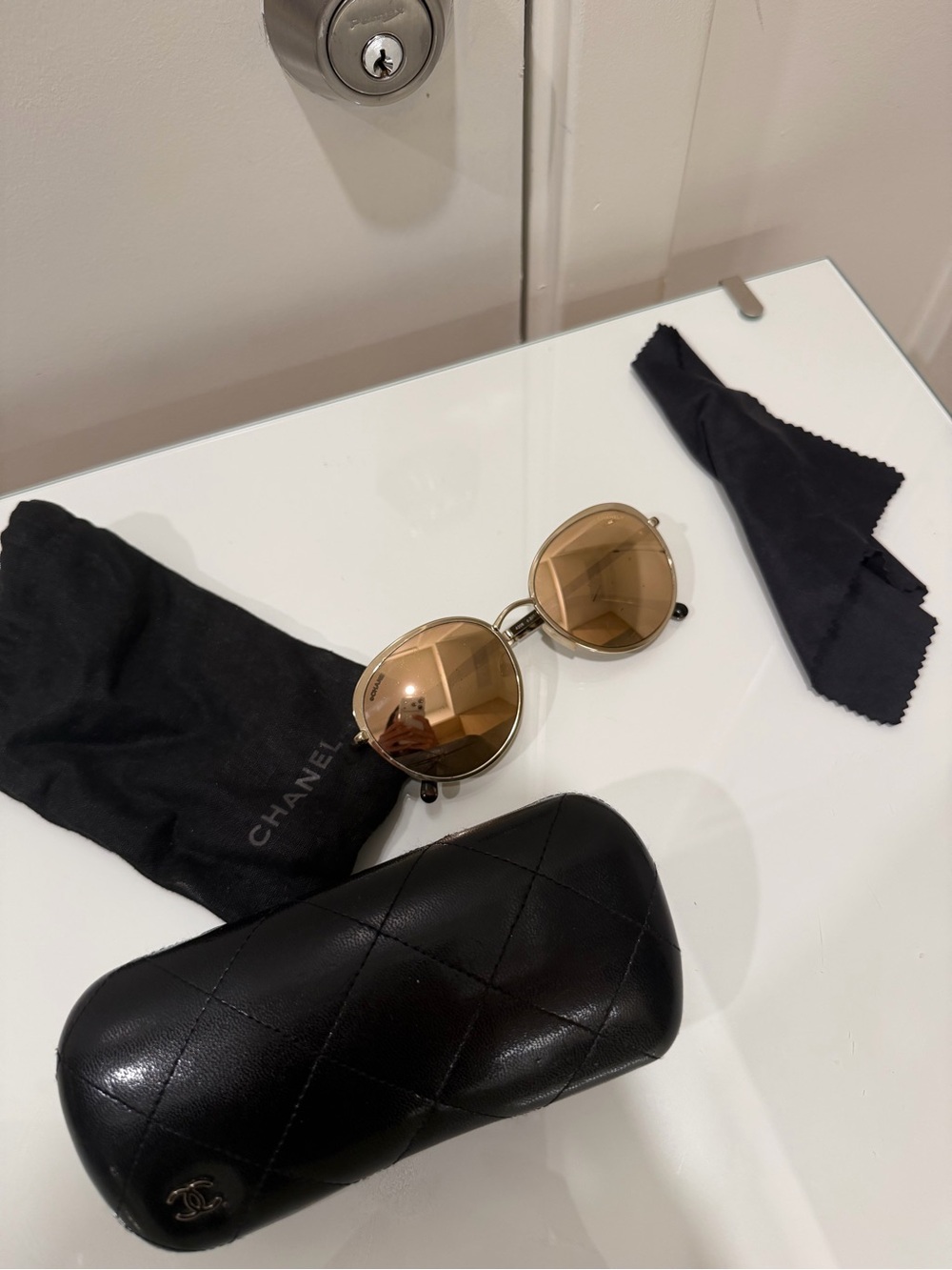 CHANEL Gold Frame Sunglasses with Brown Lenses and Black Case